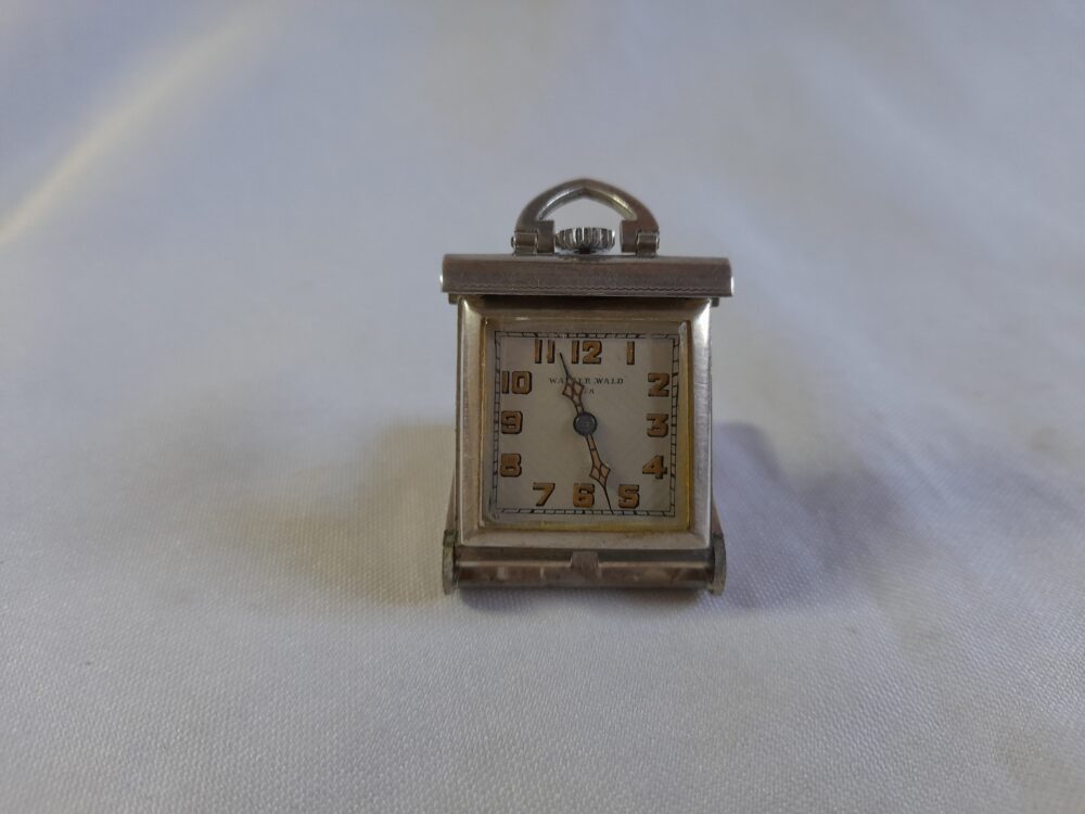 Reloj de viaje de plata alemana de la Joyeria Walser, Wald & cia..