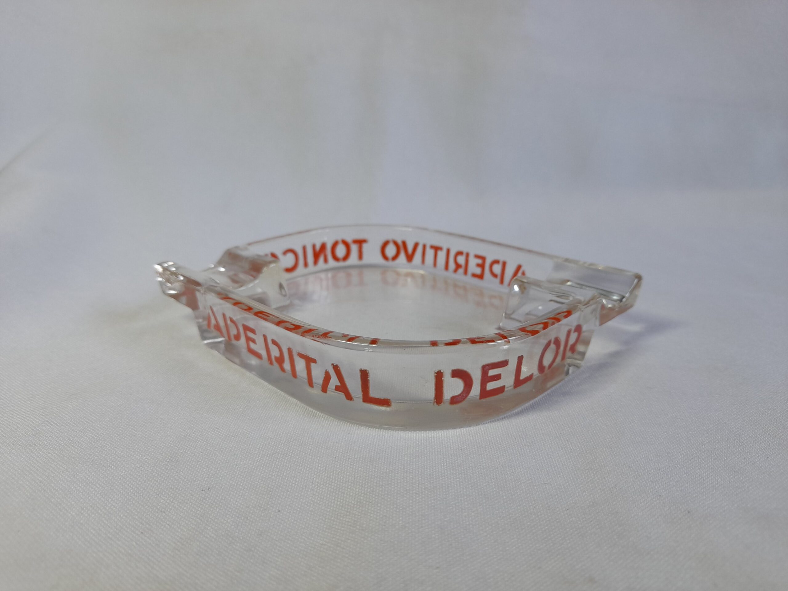 Cenicero de vidrio publicidad de Aperital Delor