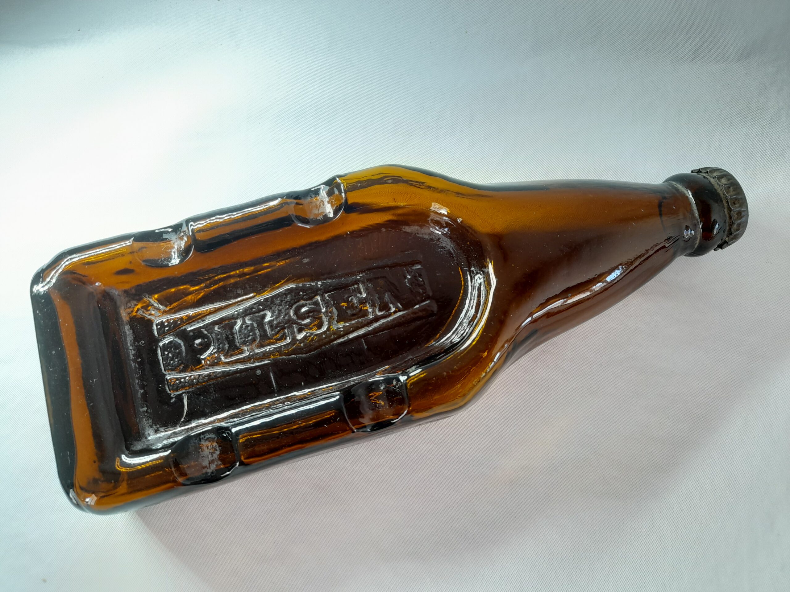 Cenicero con forma de botella cerveza Pilsen