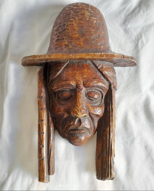 Talla en madera, F. Pusterla, Rosario.
