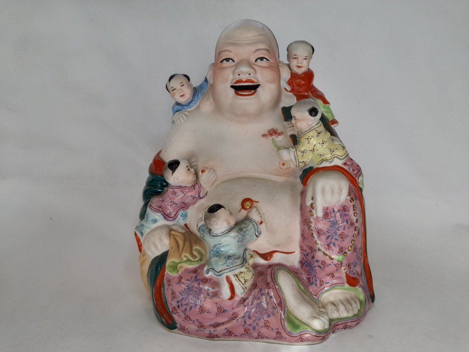 Figura de porcelana de Buda de la fertilidad